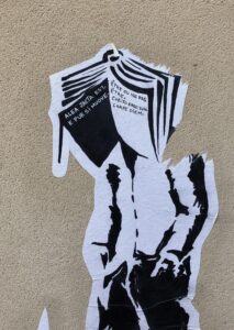 L'homme qui marche, personnage signature de l'artiste orL. Collage in street // Auxerre